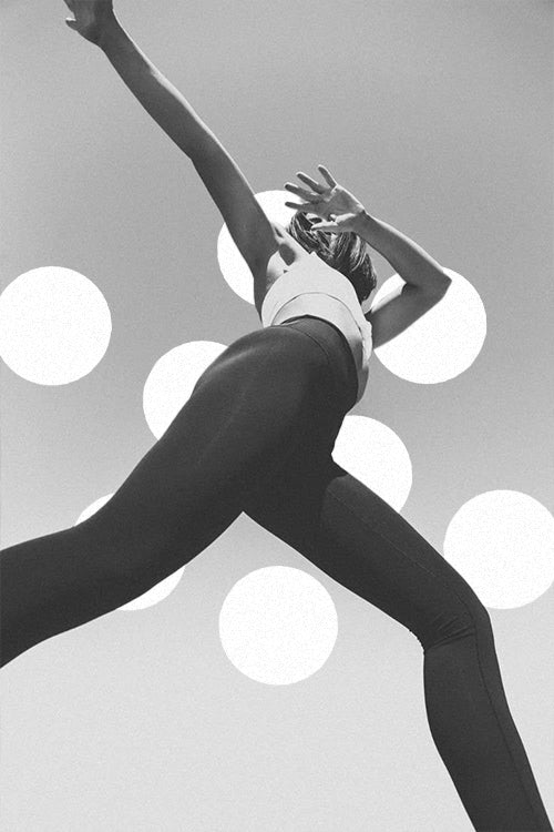 Black-and-white-image-of-a-person-in-a-yoga-pose-with-a-polka-dot-background